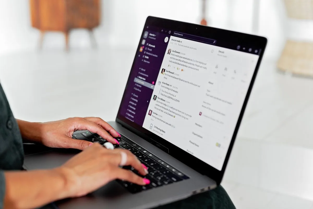 A small business owner working through the email and messages an AI agent reads, replies to, and escalates when a human is needed